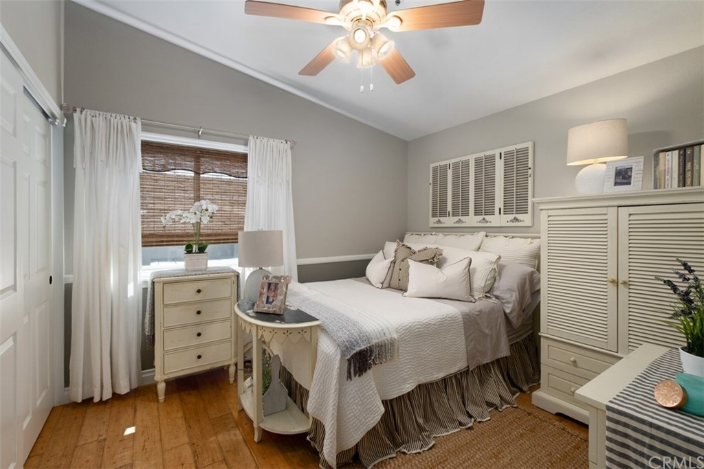 2933 Estancia San Clemente, CA 92673 - Photo 31 of 59 a bedroom with a bed and wooden floor