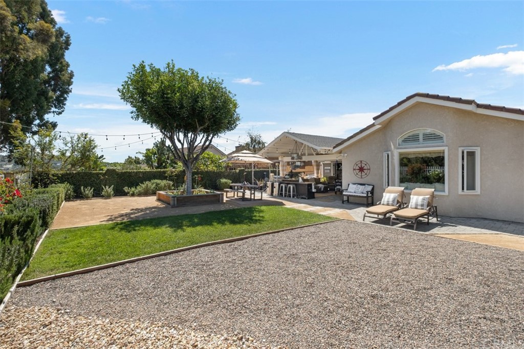 2933 Estancia San Clemente, CA 92673 - Photo 44 of 59 a view of a house with backyard porch and sitting area