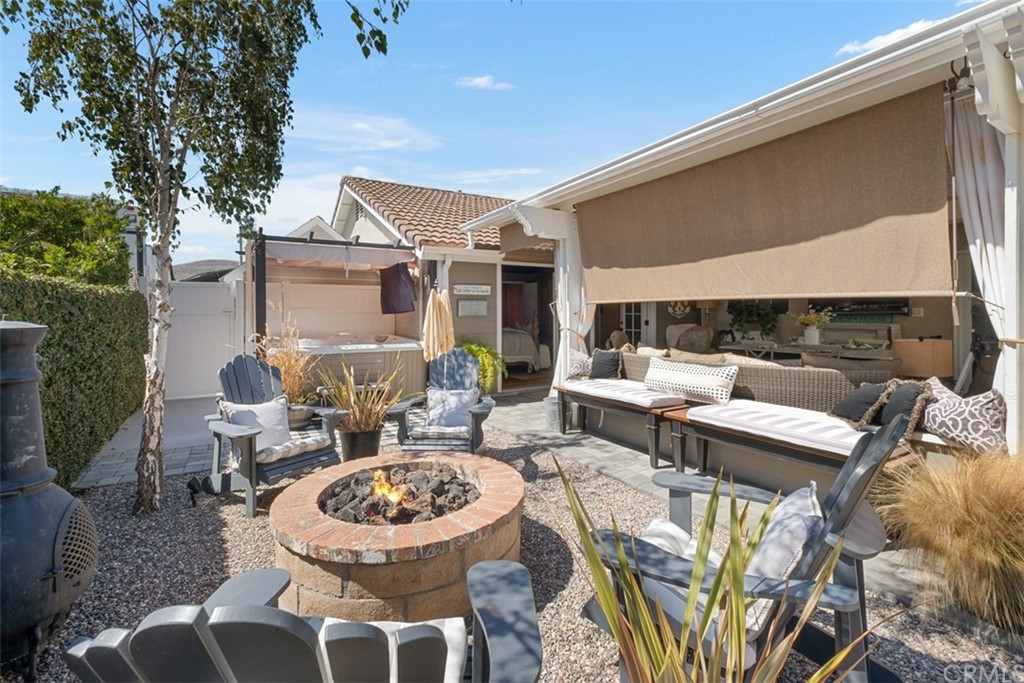 2933 Estancia San Clemente, CA 92673 - Photo 46 of 59 a view of a patio with couches table and chairs and potted plants