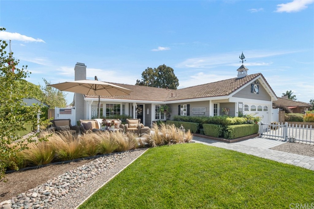 2933 Estancia San Clemente, CA 92673 - Photo 6 of 59 a front view of a house with a garden