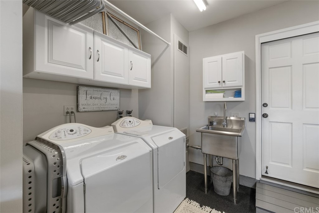 2933 Estancia San Clemente, CA 92673 - Photo 52 of 59 Laundry area with Stainless sink