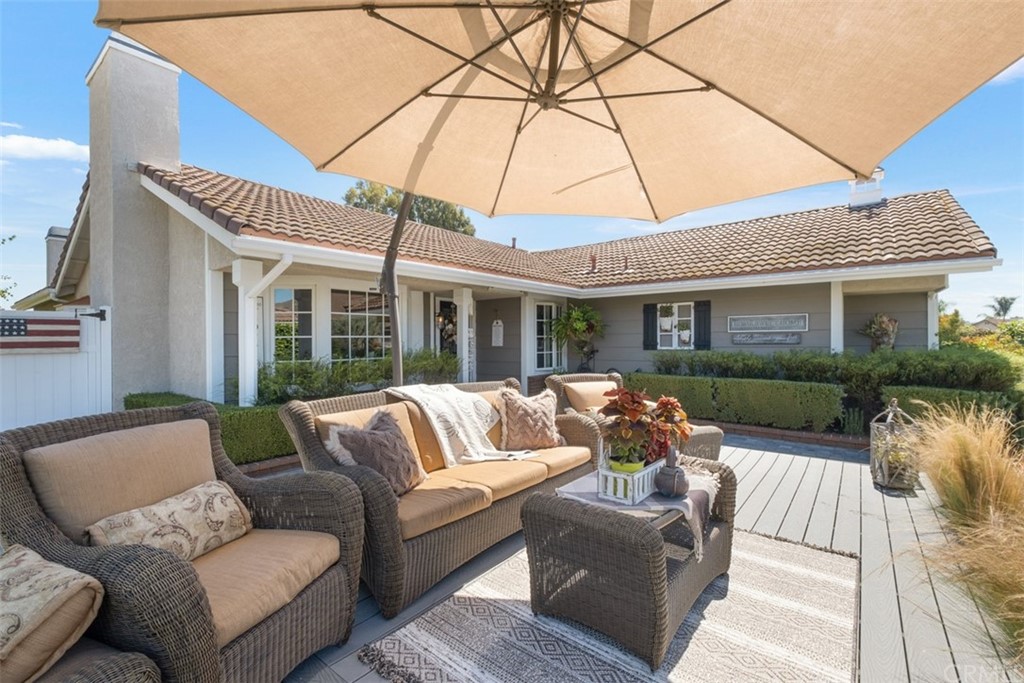 2933 Estancia San Clemente, CA 92673 - Photo 8 of 59 a view of a patio with couches and a flat screen tv