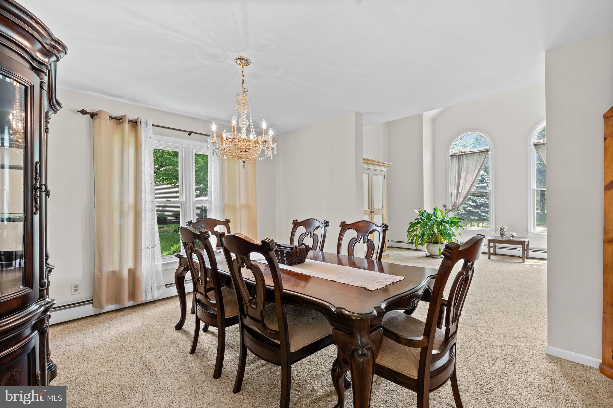 9 Jessica Court Lake Hopatcong, NJ 07849 - Photo 15 of 47 a view of a dining room with furniture and chandelier