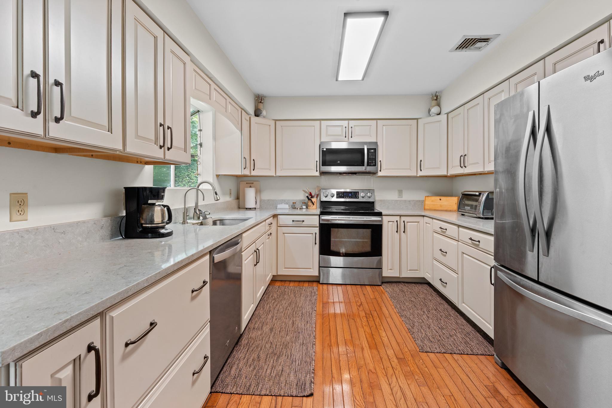 9 Jessica Court Lake Hopatcong, NJ 07849 - Photo 17 of 47 a kitchen with stainless steel appliances granite countertop a refrigerator sink and stove