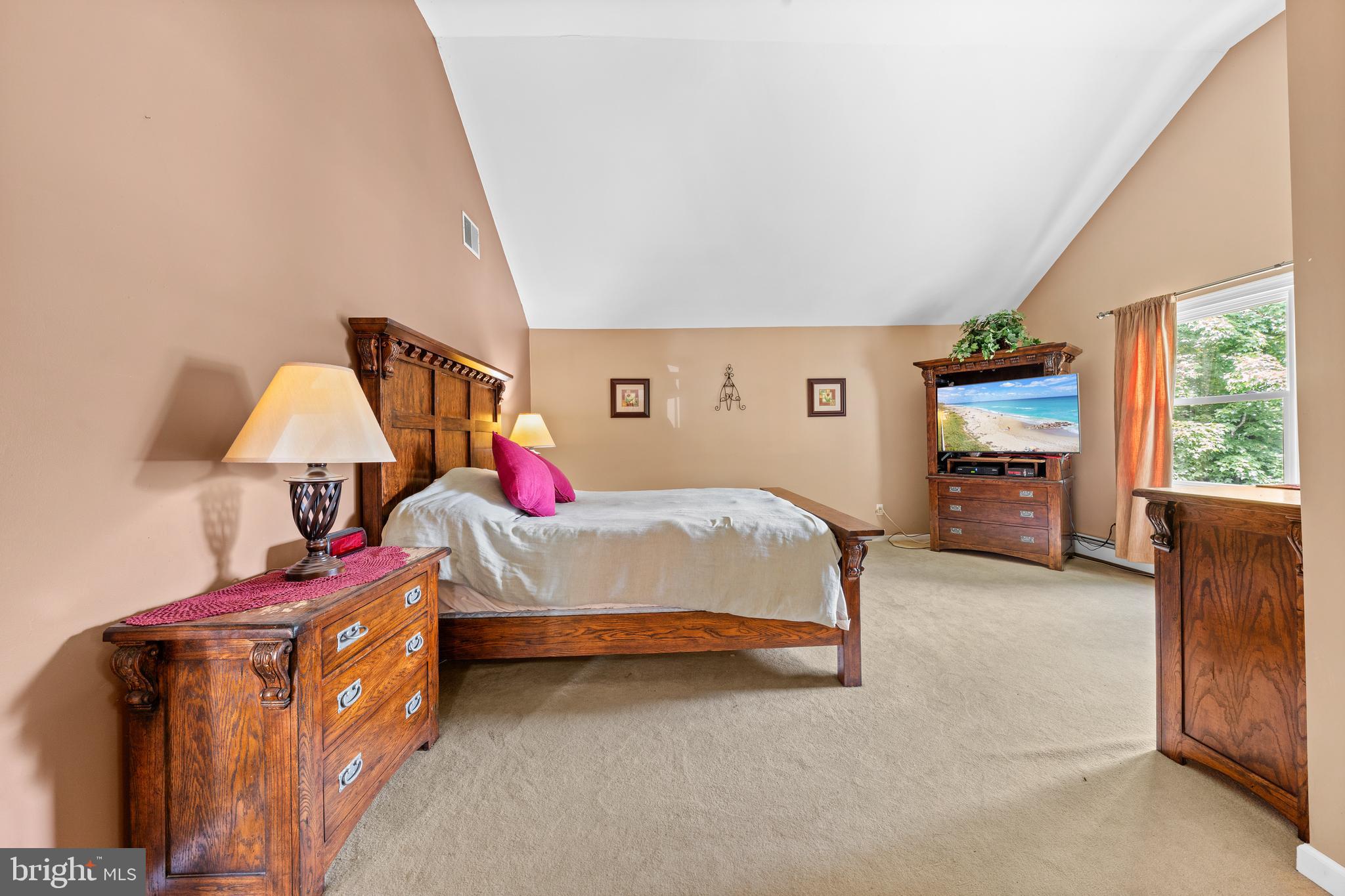 9 Jessica Court Lake Hopatcong, NJ 07849 - Photo 32 of 47 a bedroom with a bed and a window