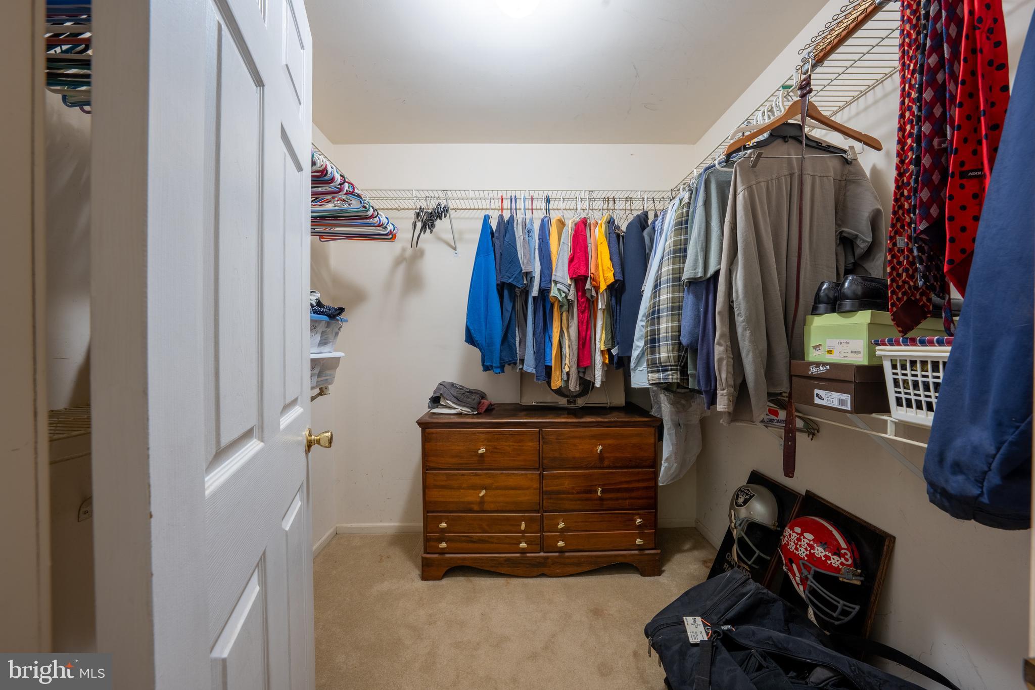 9 Jessica Court Lake Hopatcong, NJ 07849 - Photo 33 of 47 a view of walk in closet with clothes and shoes