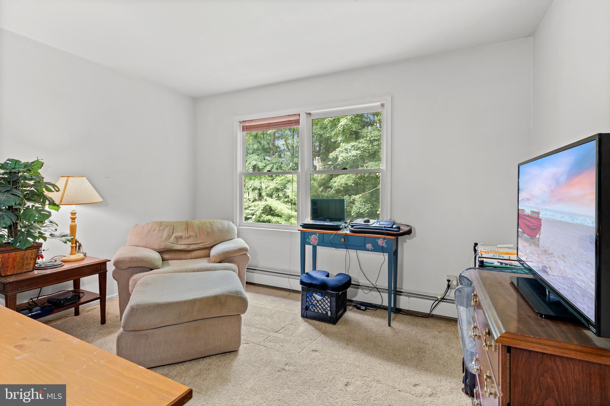 9 Jessica Court Lake Hopatcong, NJ 07849 - Photo 34 of 47 a living room with furniture and a flat screen tv
