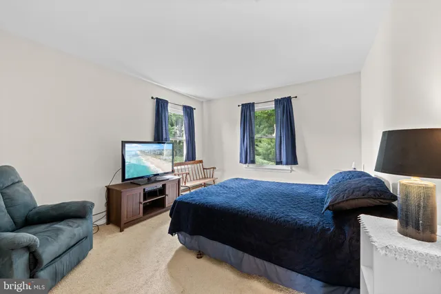 a view of balcony with wooden floor