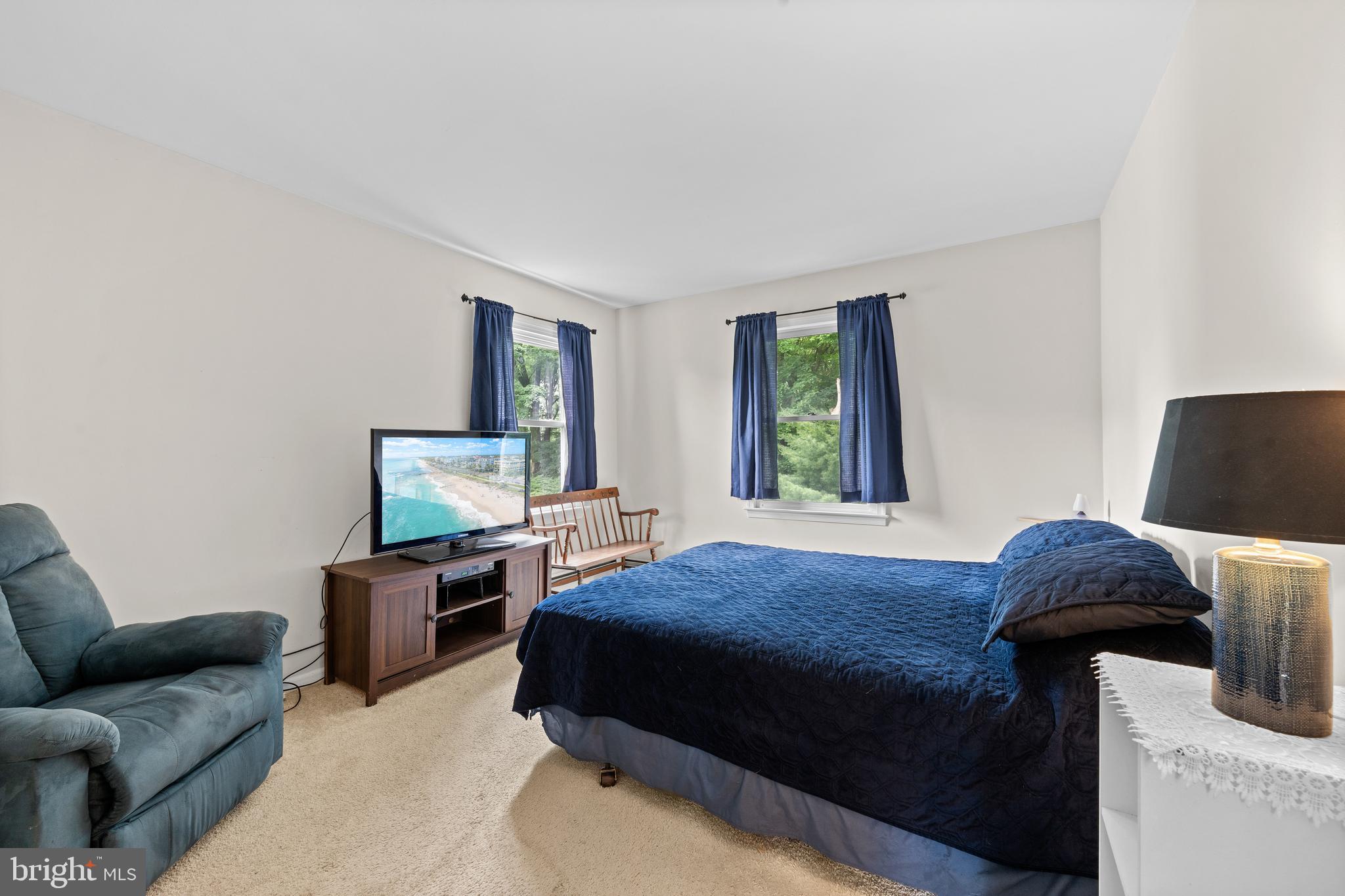 9 Jessica Court Lake Hopatcong, NJ 07849 - Photo 40 of 47 a bedroom with a bed and a couch