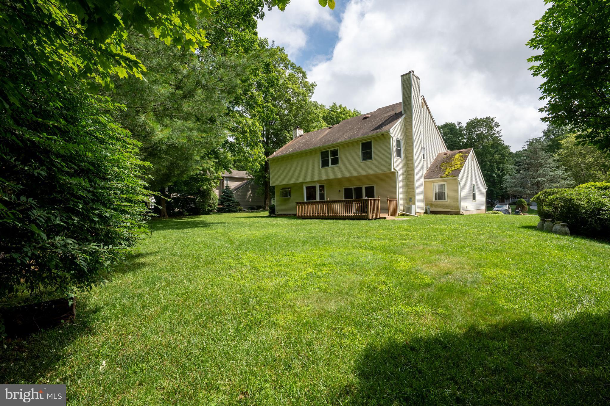9 Jessica Court Lake Hopatcong, NJ 07849 - Photo 44 of 47 a front view of a house with yard and green space