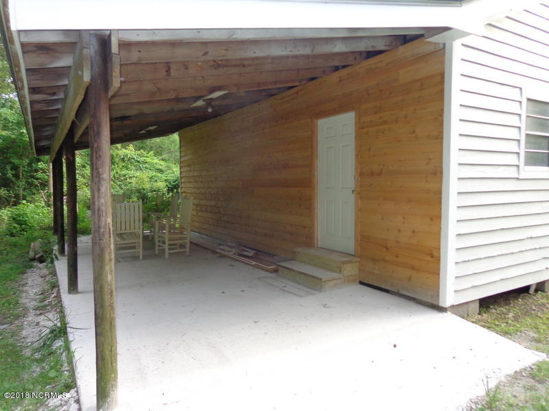 207 Old Winberry Road Newport, NC 28570 - Photo 33 of 36 Overhang Off Workshop