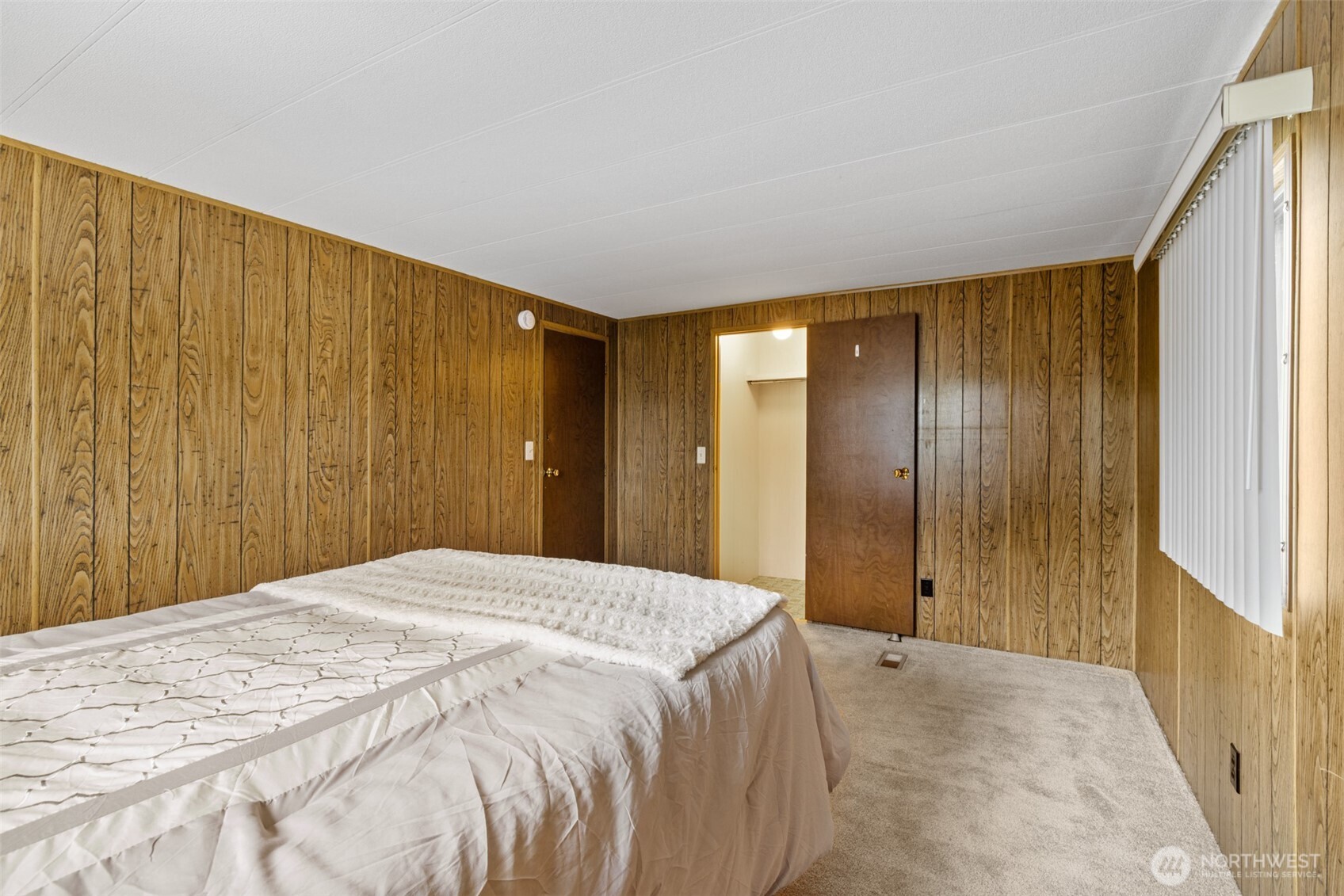 11 Juniper Mobile Estate Sequim, WA 98382 - Photo 23 of 31 a spacious bedroom with a natural light