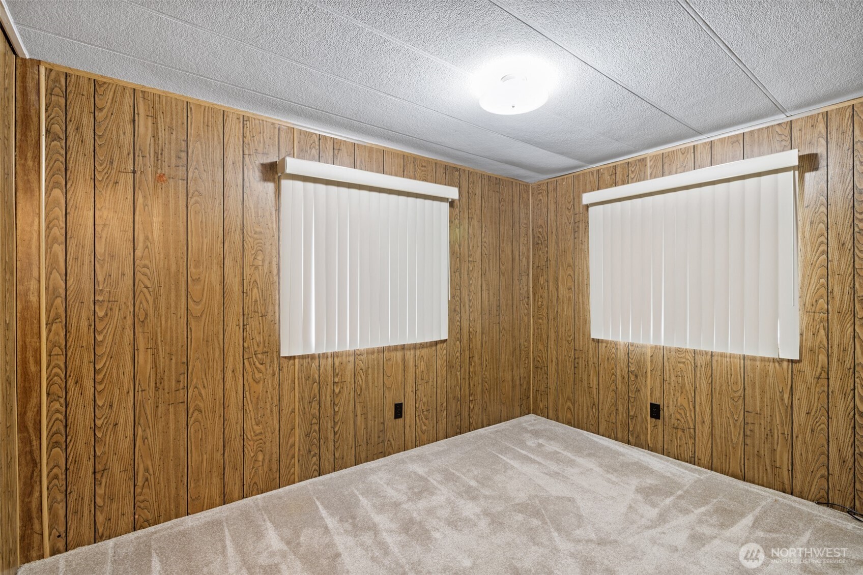11 Juniper Mobile Estate Sequim, WA 98382 - Photo 25 of 31 a view of a room with a wooden walls