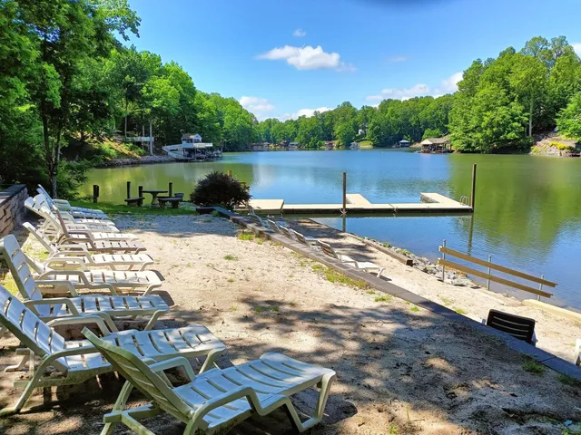 a view of a backyard with sitting area