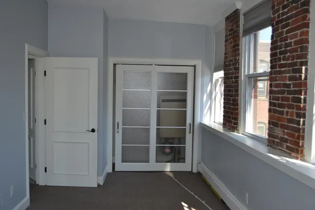 a view of empty room with a window