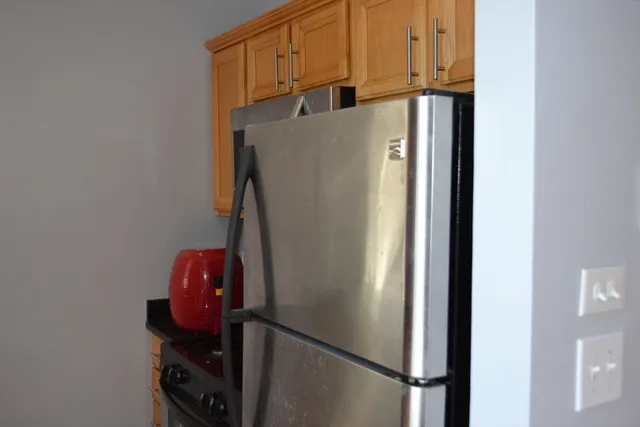 a view of a building with sitting area