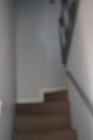 a view of empty room with a window