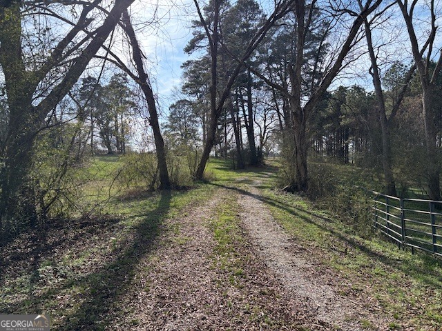 0 Barnett Road Southeast Crawfordville, GA 30631 - Photo 13 of 39 a backyard of a house with a trees