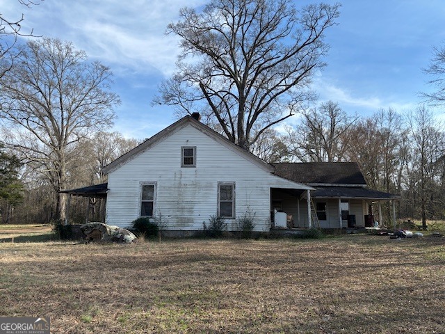 0 Barnett Road Southeast Crawfordville, GA 30631 - Photo 20 of 39 a view of a yard in front of a house with large trees