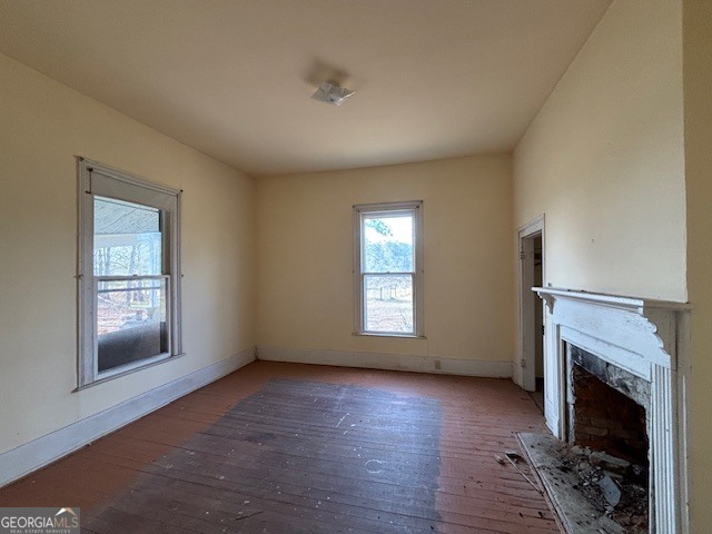 0 Barnett Road Southeast Crawfordville, GA 30631 - Photo 33 of 39 a view of an empty room with a fireplace and a window
