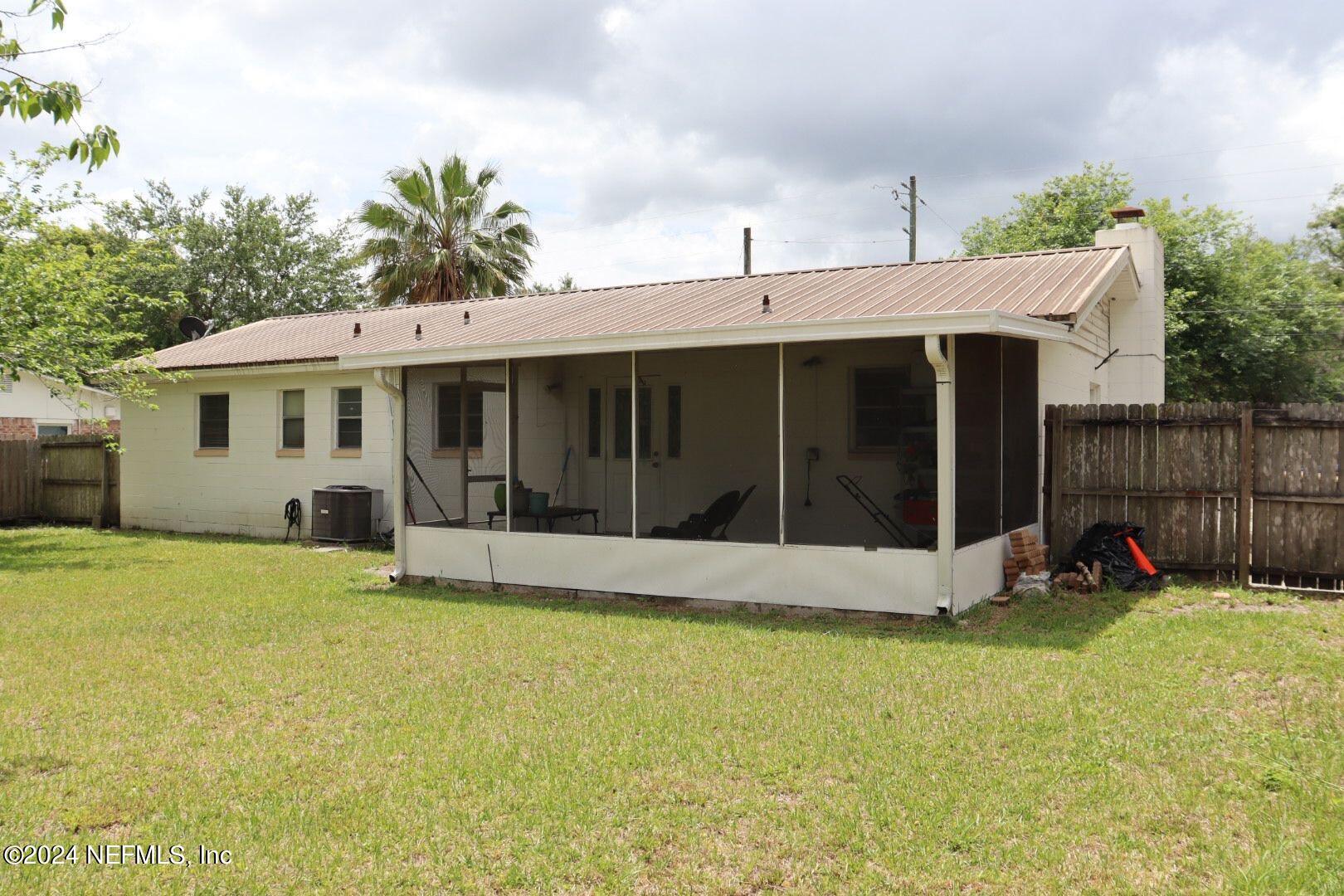7351 Wheat Road Jacksonville, FL 32244 - Photo 15 of 15 a view of a house with a yard and sitting area