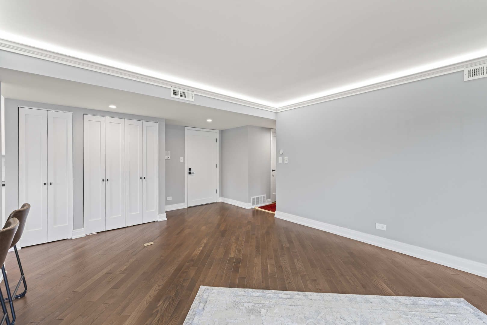 11138 Center Road, Unit D22 Palos Hills, IL 60465 - Photo 11 of 21 a view of an empty room with wooden floor