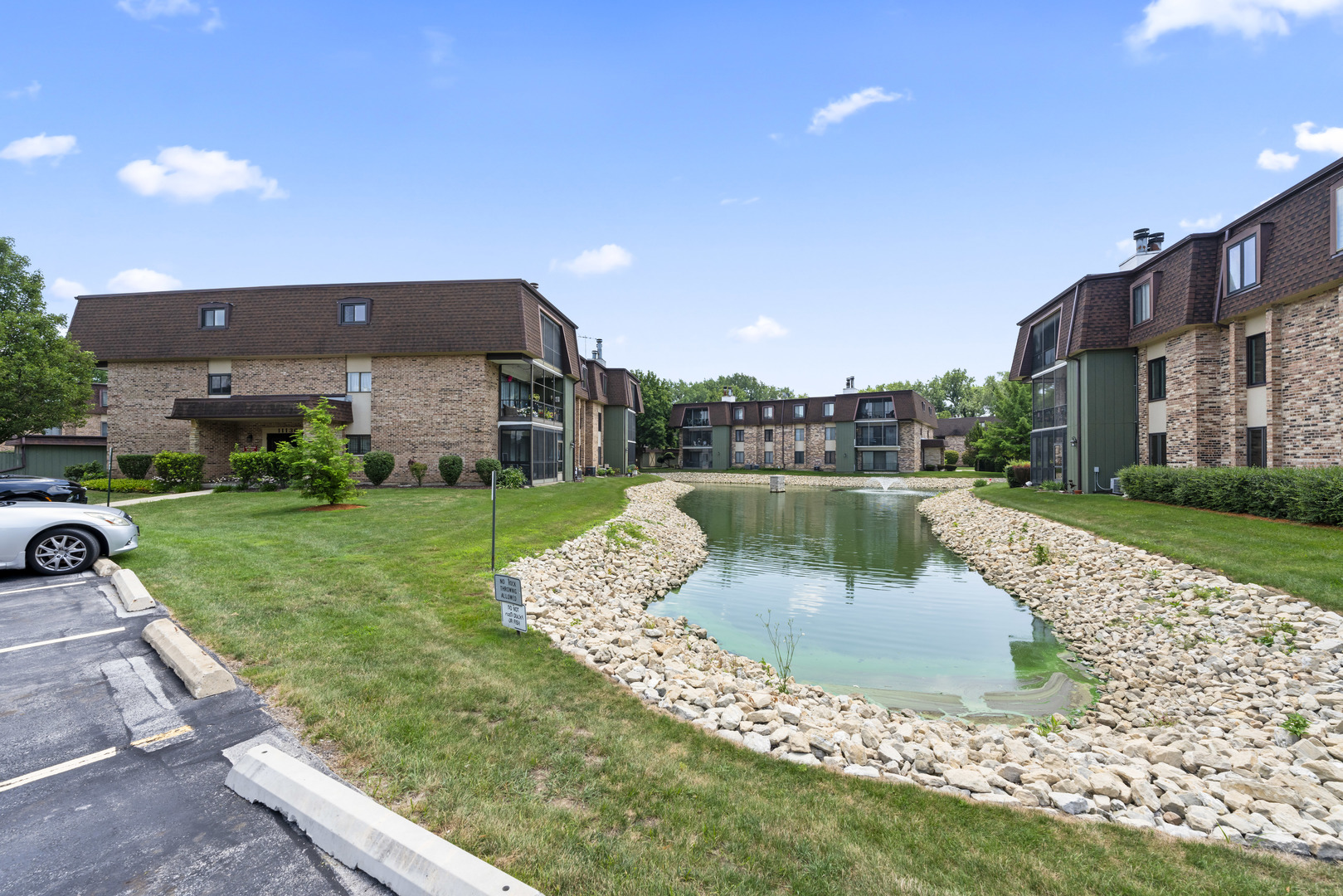 11138 Center Road, Unit D22 Palos Hills, IL 60465 - Photo 20 of 21 a view of a house with a yard