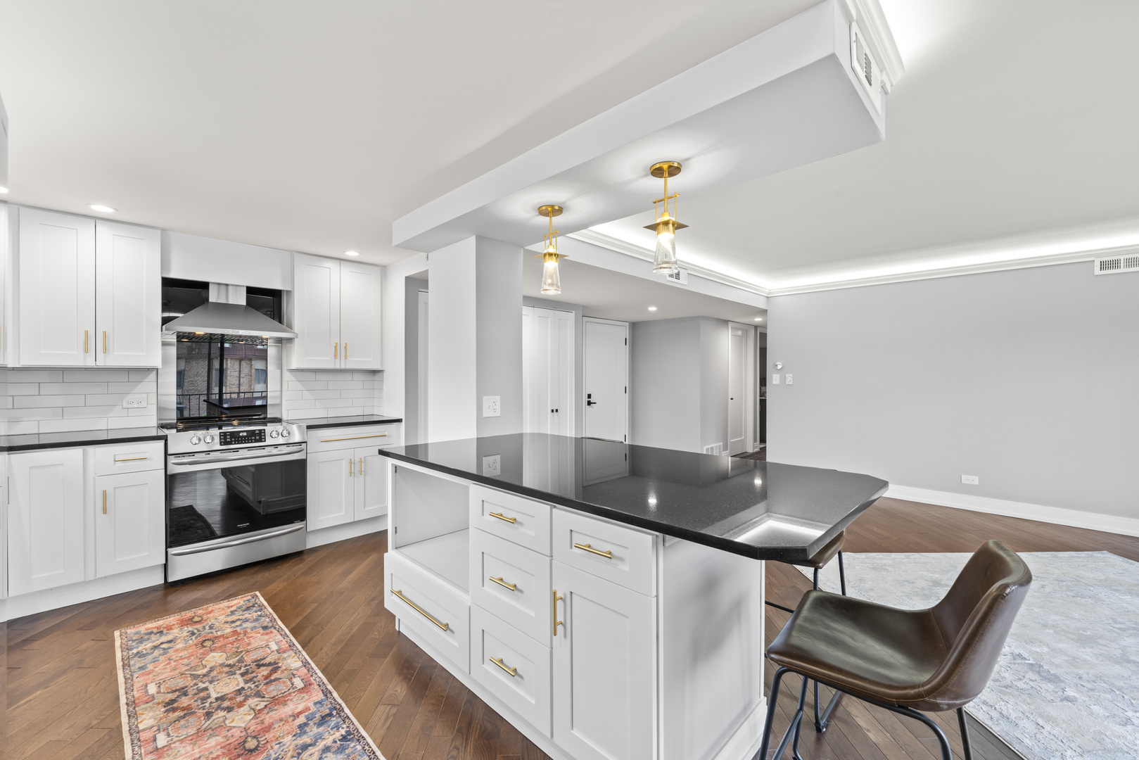 11138 Center Road, Unit D22 Palos Hills, IL 60465 - Photo 7 of 21 a kitchen with granite countertop a sink cabinets and stainless steel appliances