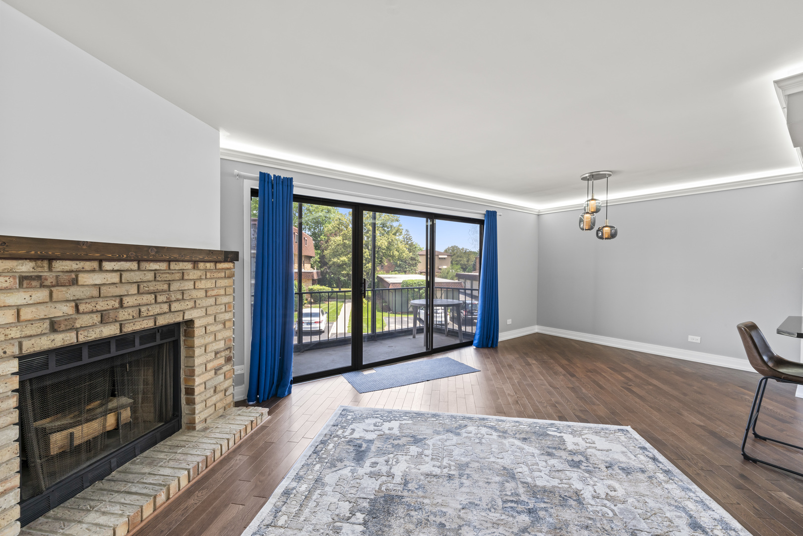 11138 Center Road, Unit D22 Palos Hills, IL 60465 - Photo 10 of 21 an empty room with furniture fireplace and windows