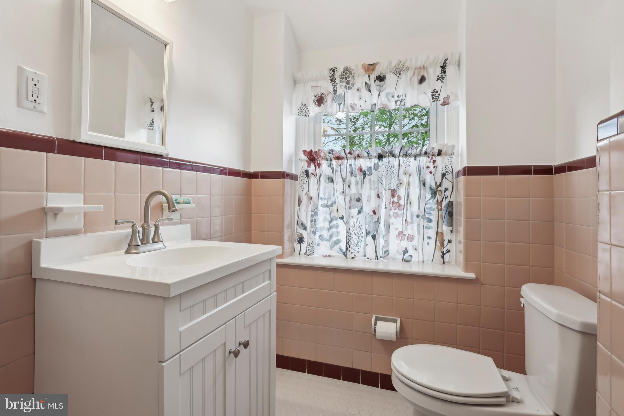 522 West Springfield Road Springfield, PA 19064 - Photo 35 of 43 a bathroom with a sink vanity mirror and toilet