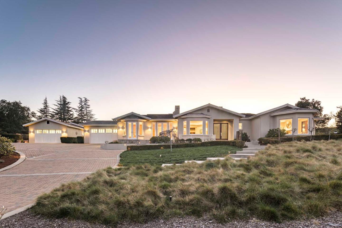 187 Hardwick Road Woodside, CA 94062 - Photo 1 of 39 a front view of a house with a yard and lake view