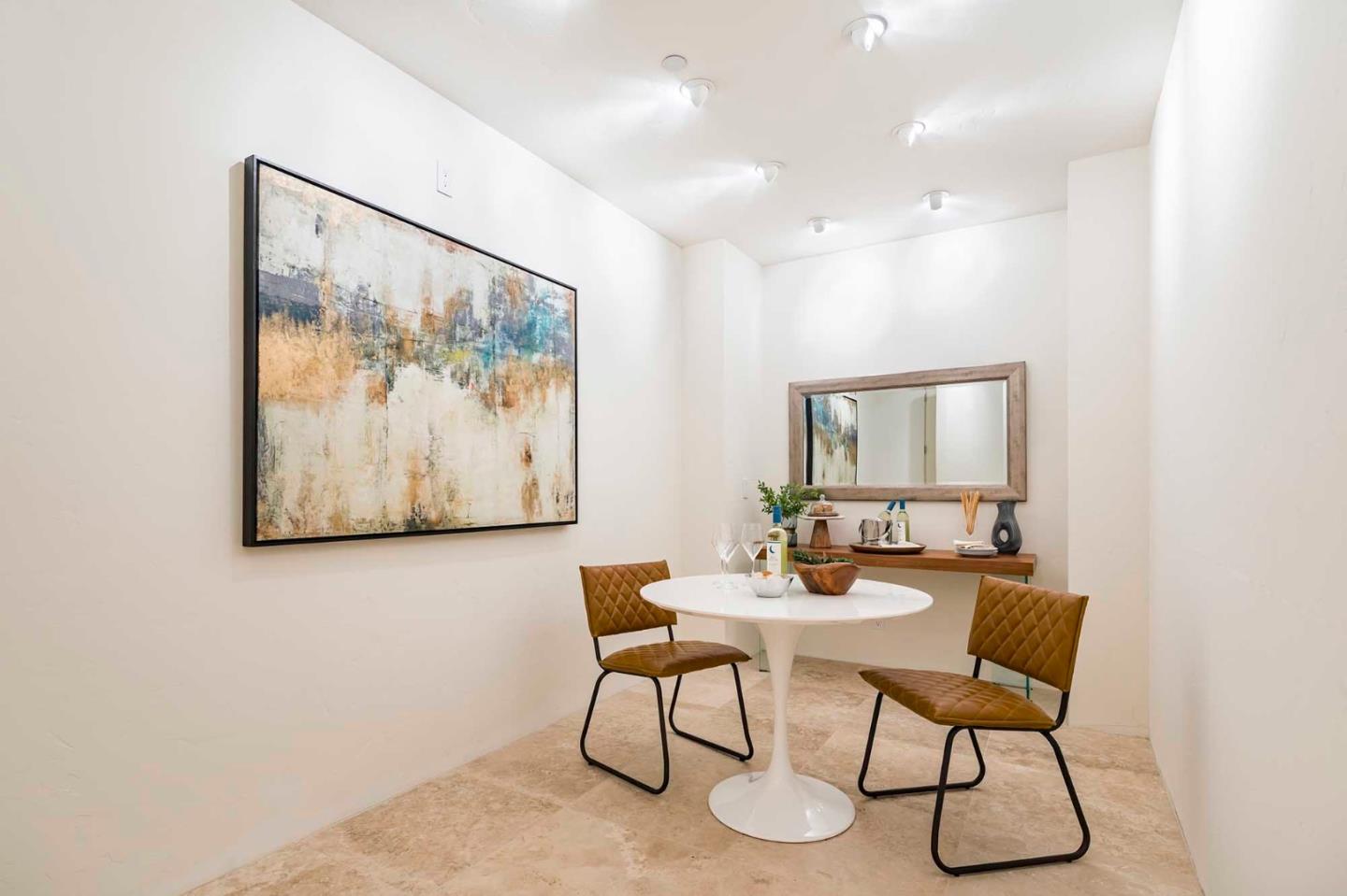 187 Hardwick Road Woodside, CA 94062 - Photo 18 of 39 a dining room with furniture and a painting