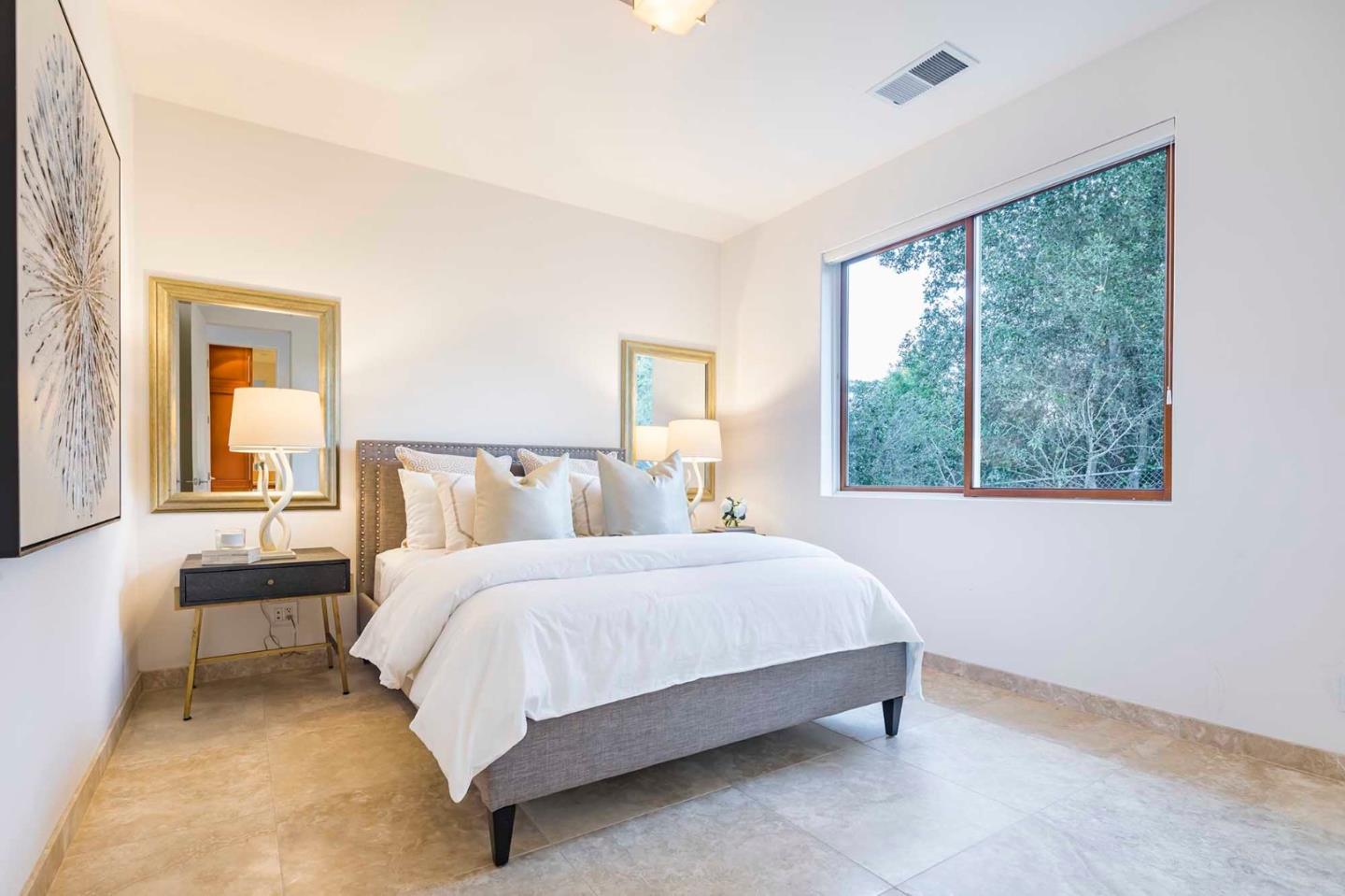 187 Hardwick Road Woodside, CA 94062 - Photo 35 of 39 a bedroom with a bed and a large window