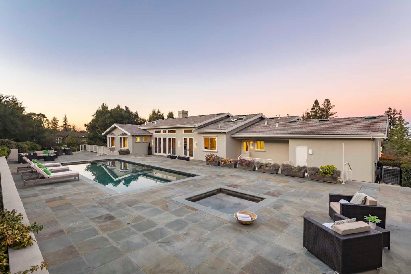 187 Hardwick Road Woodside, CA 94062 - Photo 36 of 39 a view of a house with patio and a garden