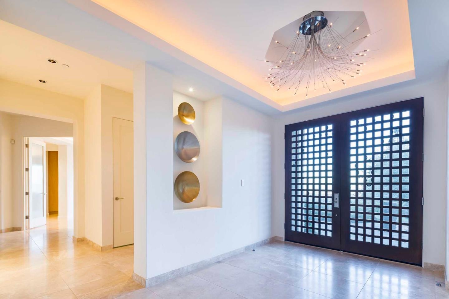 187 Hardwick Road Woodside, CA 94062 - Photo 5 of 39 a view of a hallway with wooden floor