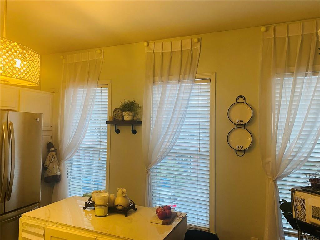 3914 Howell Park Road Duluth, GA 30096 - Photo 8 of 33 a bathroom with a sink mirror and shower