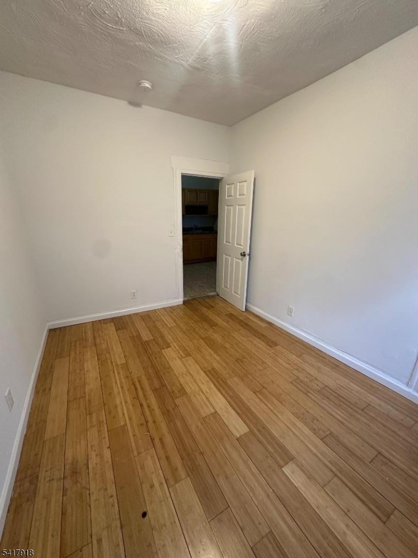 27 Pingry Place, Unit 1 Elizabeth, NJ 07208 - Photo 10 of 10 wooden floor in a room