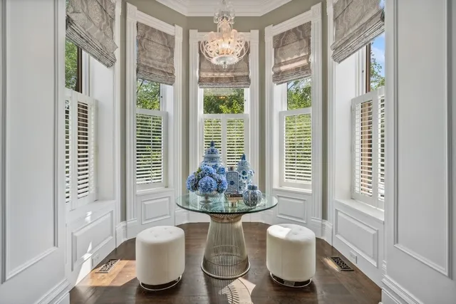 a kitchen with granite countertop a sink stove and cabinets