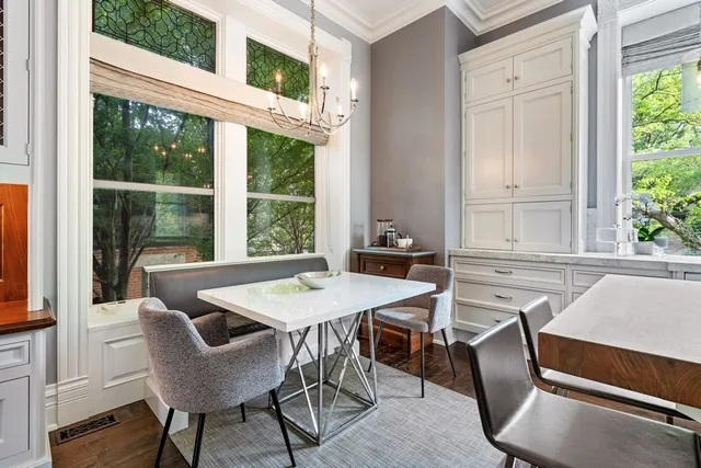 a view of entryway with wooden floor and stairs