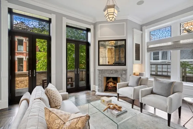 a spacious bedroom with a bed and a window