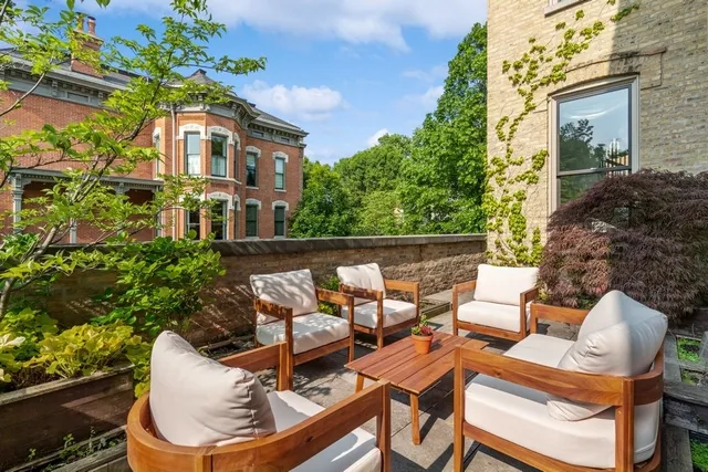 a bed room with a bed and a table