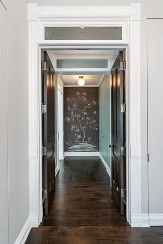 a view of a dining room with furniture and windows