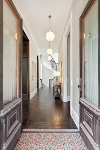 a living room with furniture fireplace and window