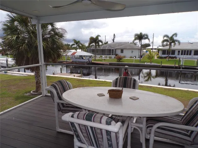 a view of a swimming pool with a patio