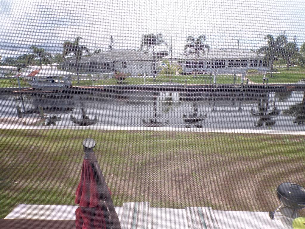 721 Marlin Drive Punta Gorda, FL 33950 - Photo 28 of 50 a view of a swimming pool and a terrace