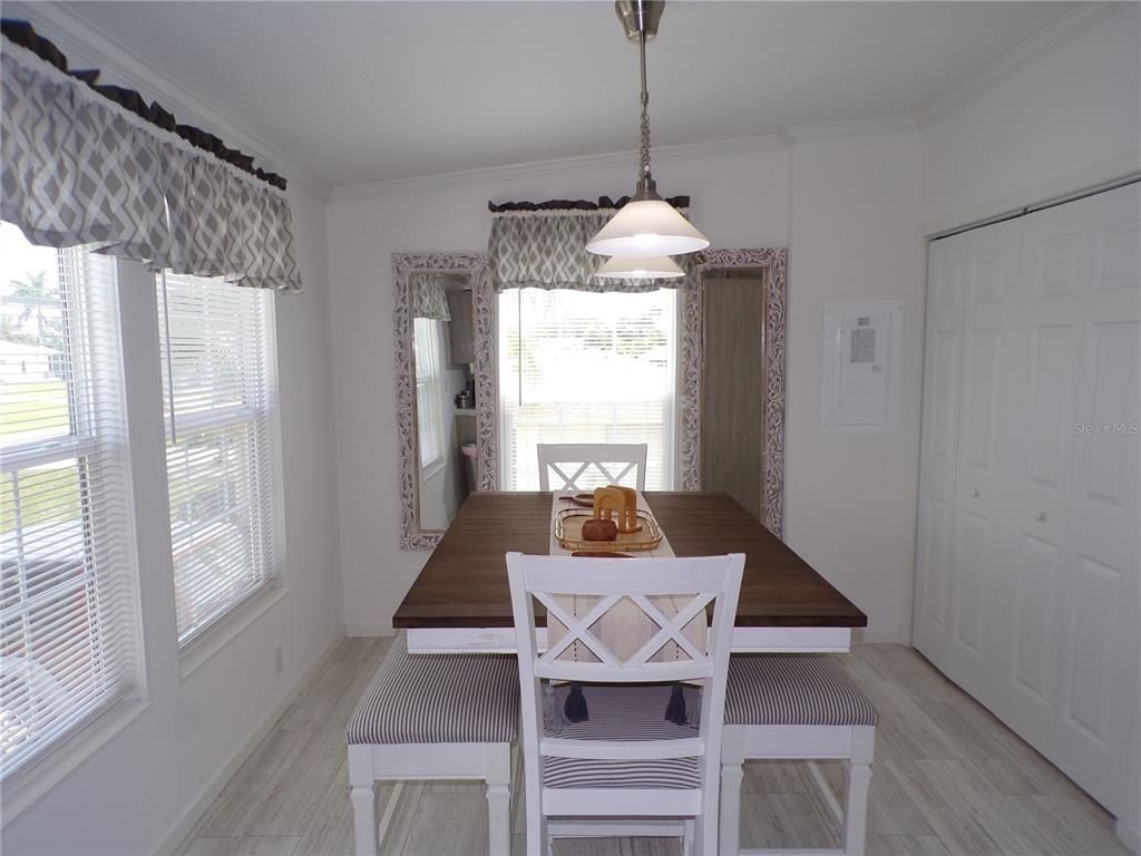 721 Marlin Drive Punta Gorda, FL 33950 - Photo 38 of 50 a view of a dining room with furniture window and outside view