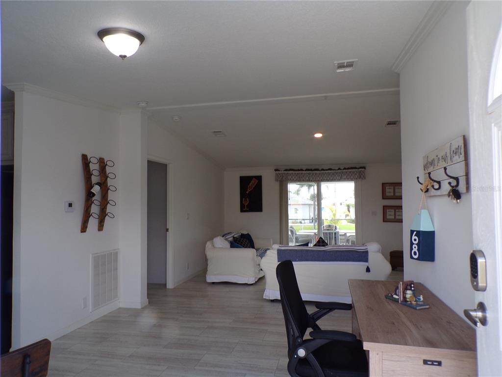 721 Marlin Drive Punta Gorda, FL 33950 - Photo 39 of 50 a living room with furniture and a window