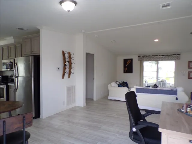 a workspace with furniture and a window