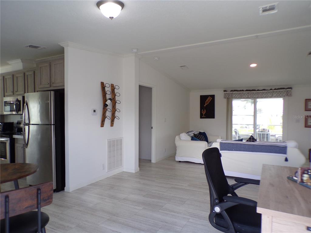 721 Marlin Drive Punta Gorda, FL 33950 - Photo 4 of 50 a workspace with furniture and a window