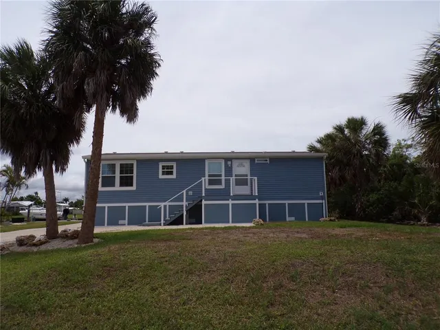 a front view of a house with patio
